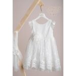 Βαπτιστικό φόρεμα Piccolino Aphrodite Ivory, Φόρεμα μεσάτο με μπούστο απο δαντέλα, μανικάκι σε σχήμα angel wings απο πουά τούλι, στο πίσω μέρος καταλήγει σε ένα υπέροχο V με φιόγκο απο δαντέλα για ντεκορ. Δαντελένια φούστα με βολάν σε 2 επίπεδα με πουα τούλι να βγαίνει απο κάτω. Το ντεκόρ του φορέματος αποτελείται απο χειροποίητα λουλούδια, μαραμπού καιστρας. Το φόρεμα συνοδέυεται απο στέκα με ντεκόρ όμοιο με το φόρεμα.